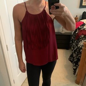 Maroon tank with fringe.  Size large.